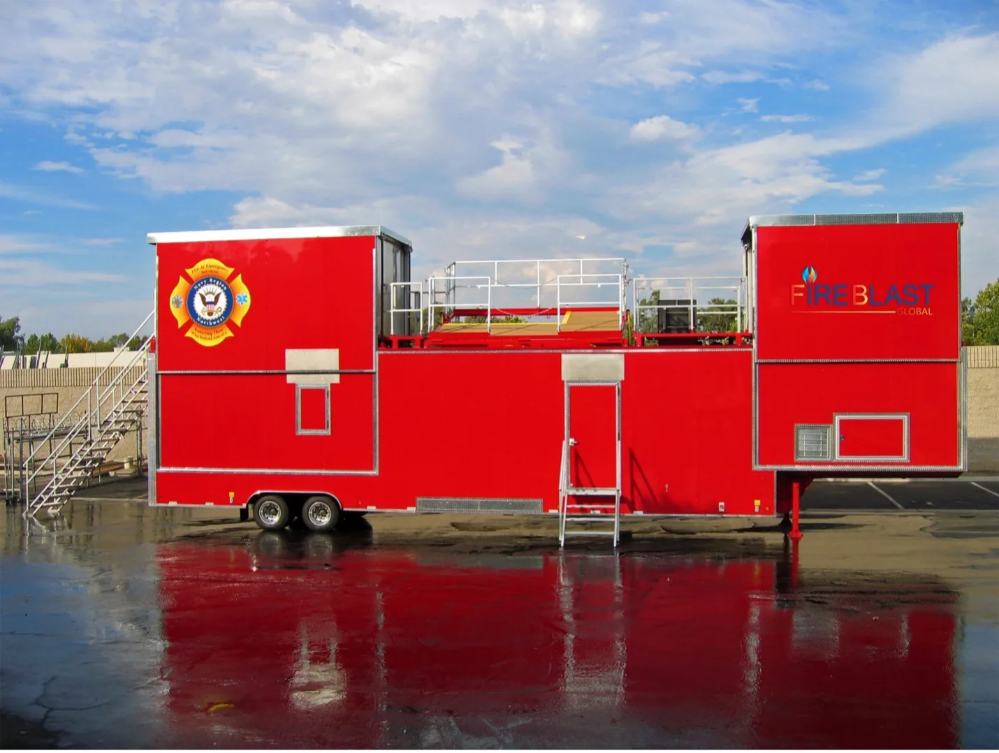Red purpose-built fire training trailer